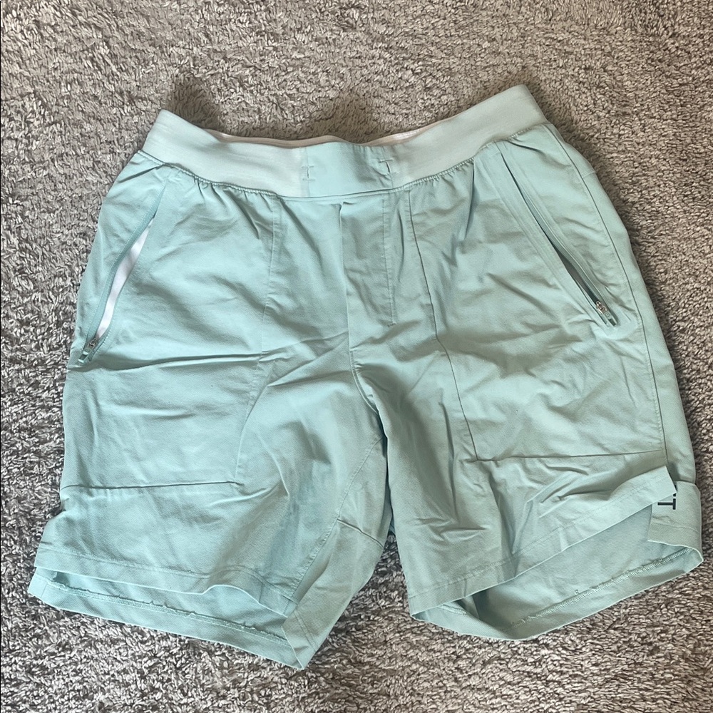 Lululemon Teal linerless 7”